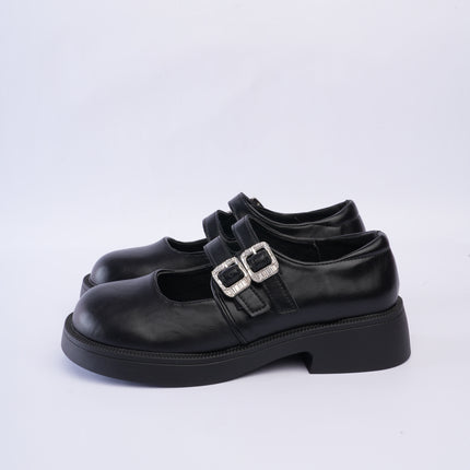 Mocasines negros con doble hebilla