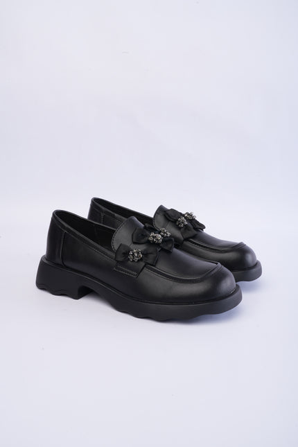 Mocasines negros con moños