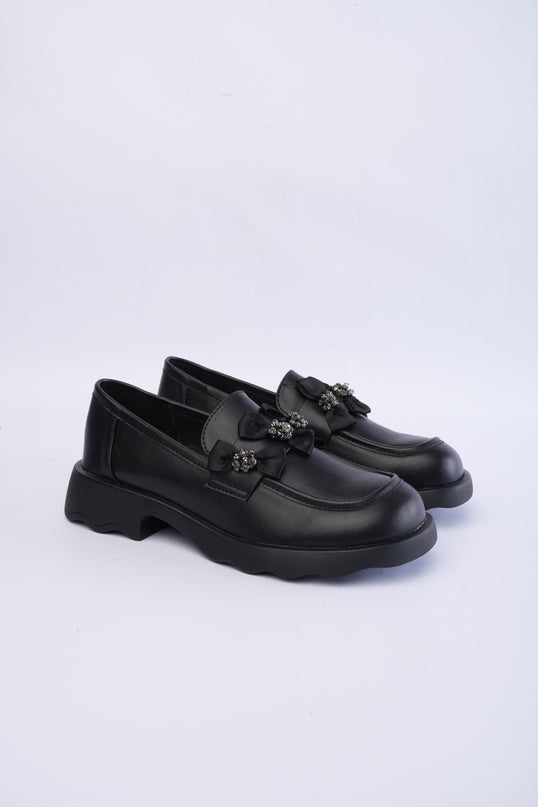 Mocasines negros con moños
