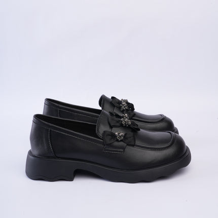 Mocasines negros con moños
