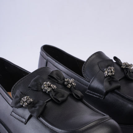 Mocasines negros con moños