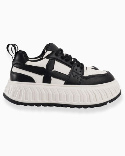 Tenis blanco x negro líneas