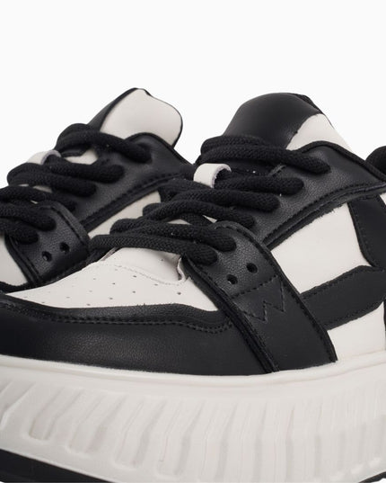 Tenis blanco x negro líneas