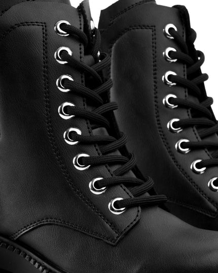 Botín negro cordones y resorte trasero