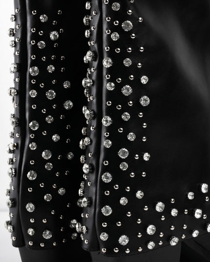 Botas de tacón negras con múltiples taches plateados