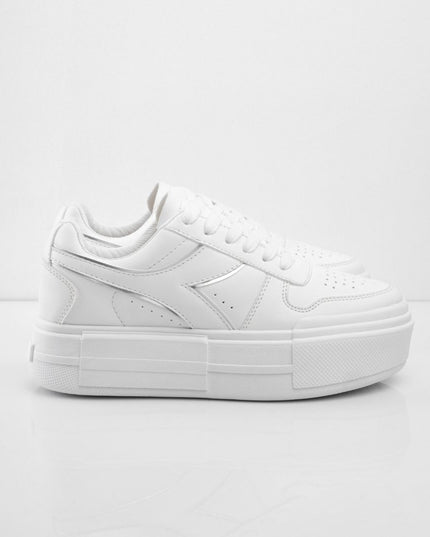 Tenis blancos con plataforma y líneas plateadas