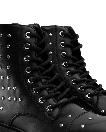 Botines negros bajos taches