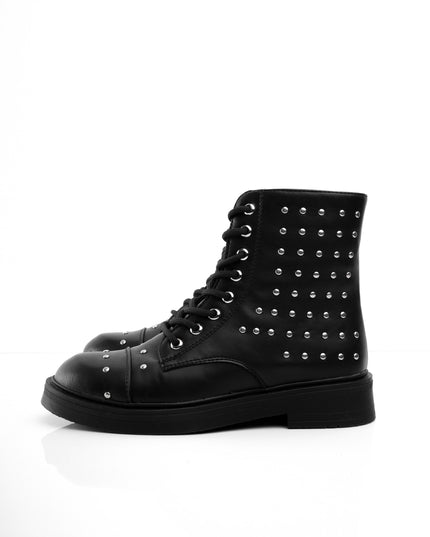 Botines negros bajos taches