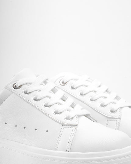 Tenis blancos plataforma y brillante
