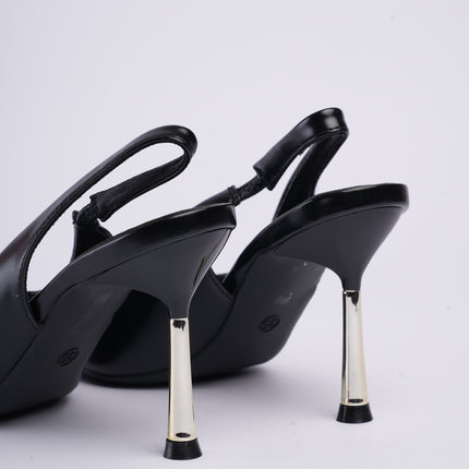 Tacones altos destalonados negros