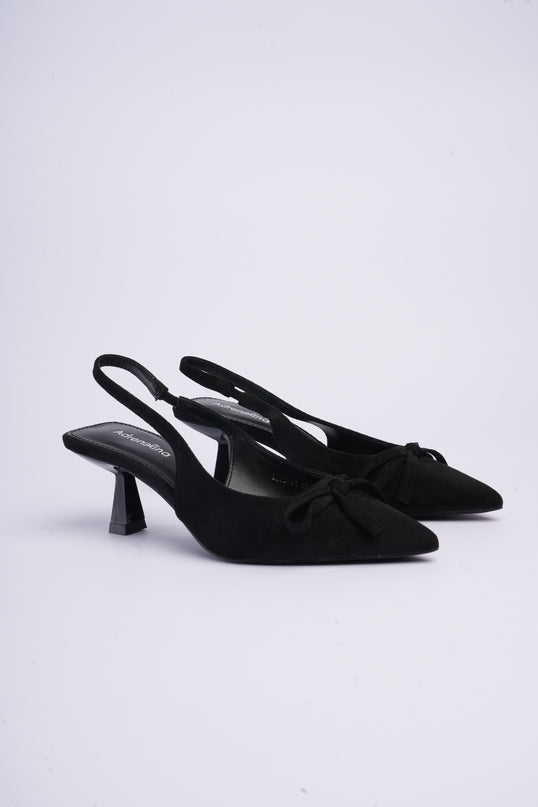 Tacones bajos con moño negros