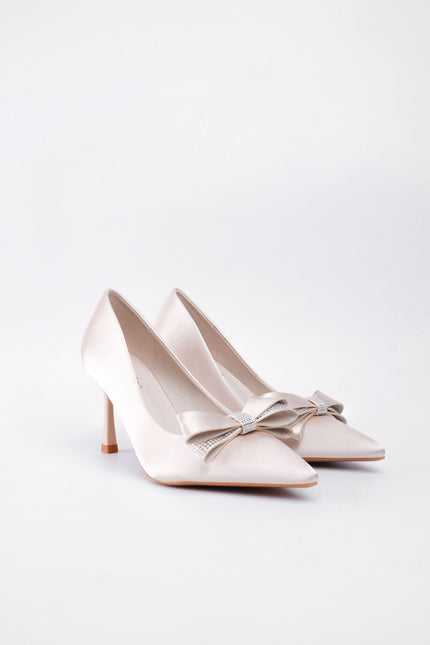Tacones beige altos con moño