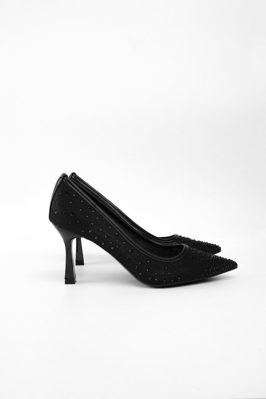 Tacones negros transparentes con apliques