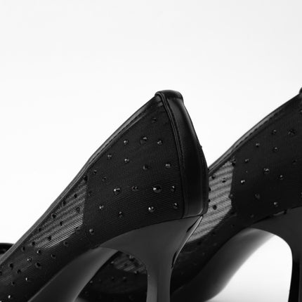 Tacones negros transparentes con apliques