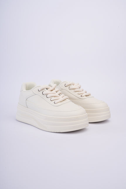Tenis altos beige básicos