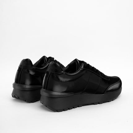 Tenis bajos negros brillantes