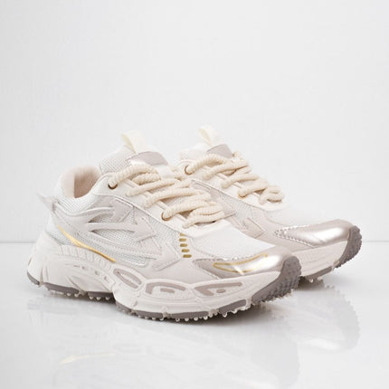 Tenis beige con líneas doradas