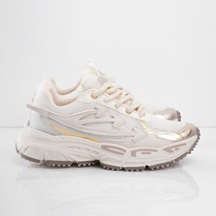 Tenis beige con líneas doradas