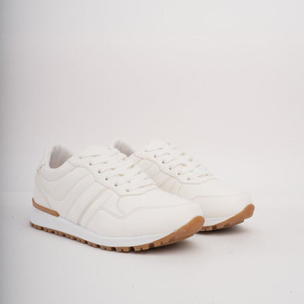 Tenis blancos bajos clásicos y suela beige