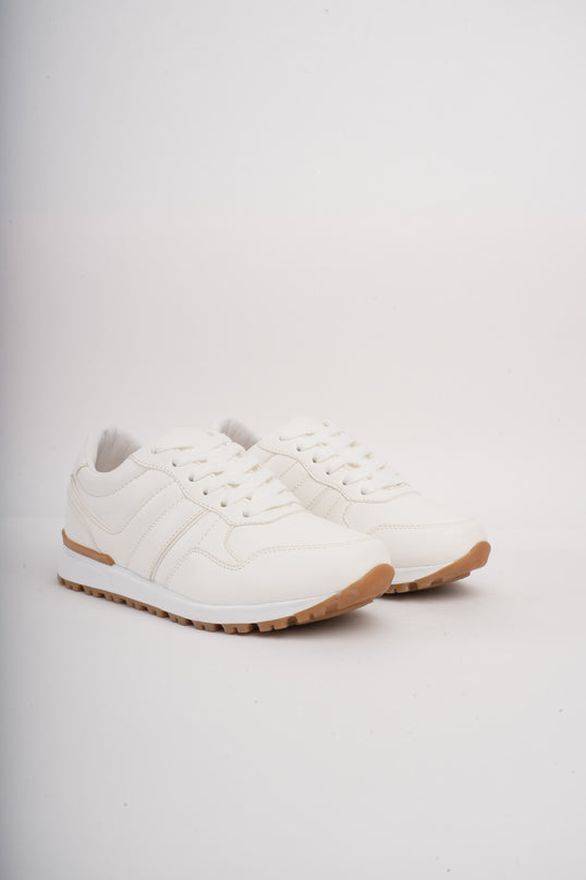 Tenis blancos bajos clásicos y suela beige