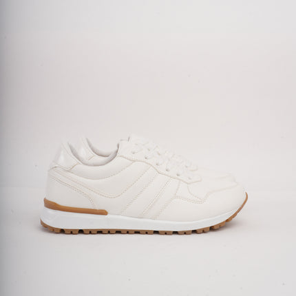Tenis blancos bajos clásicos y suela beige