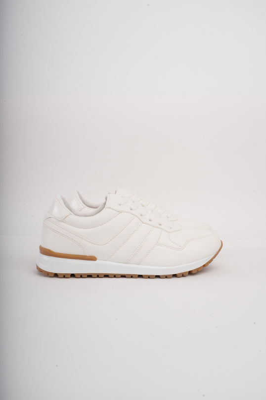 Tenis blancos bajos clásicos y suela beige