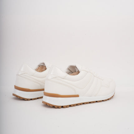 Tenis blancos bajos clásicos y suela beige