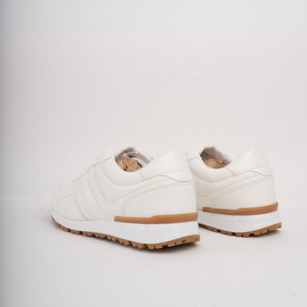 Tenis blancos bajos clásicos y suela beige