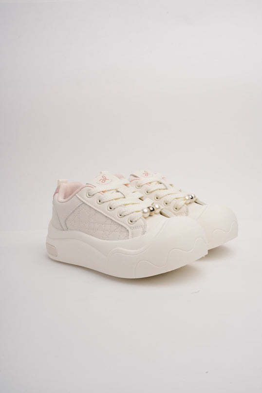 Tenis blancos con rosa y suela gruesa