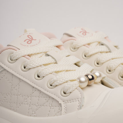 Tenis blancos con rosa y suela gruesa