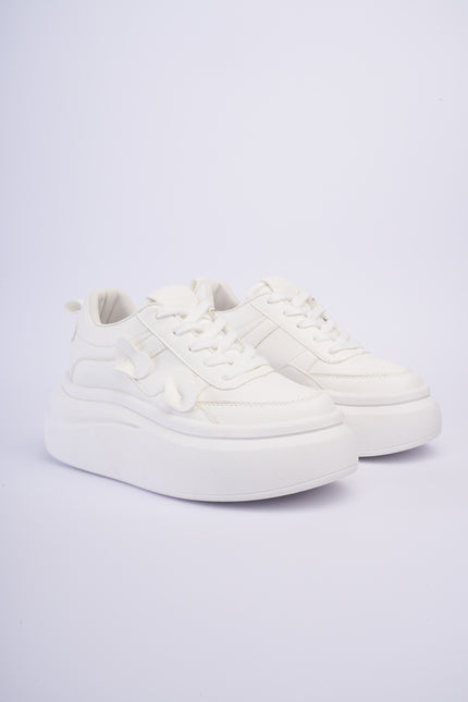 Tenis blancos de plataforma altos