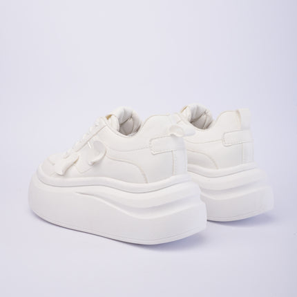 Tenis blancos de plataforma altos