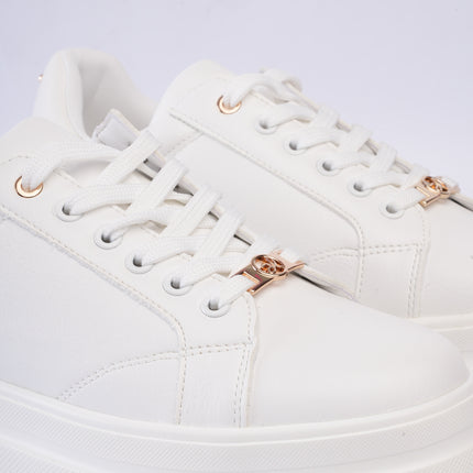 Tenis blancos x plataforma y aplique