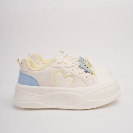 Tenis crema con detalles azul y amarillo