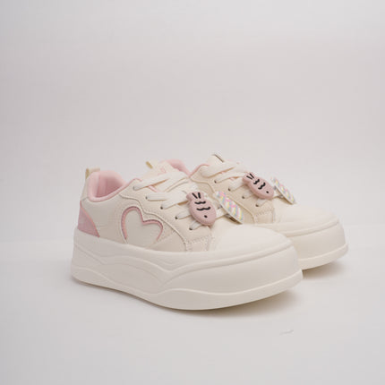 Tenis crema con detalles rosa