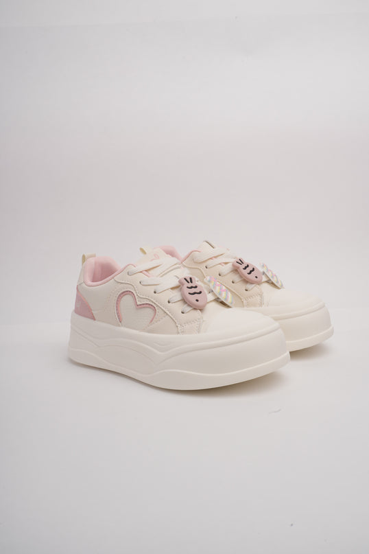Tenis crema con detalles rosa