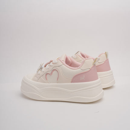 Tenis crema con detalles rosa