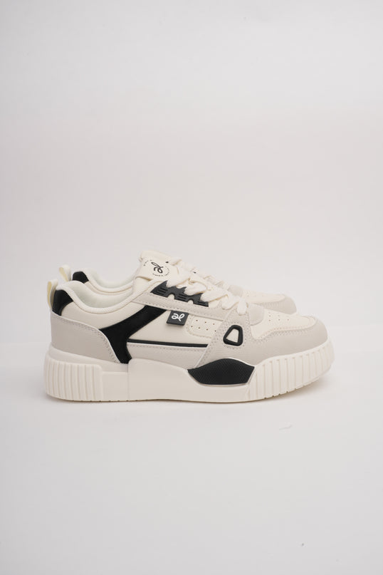Tenis crema con gris y detalles negros