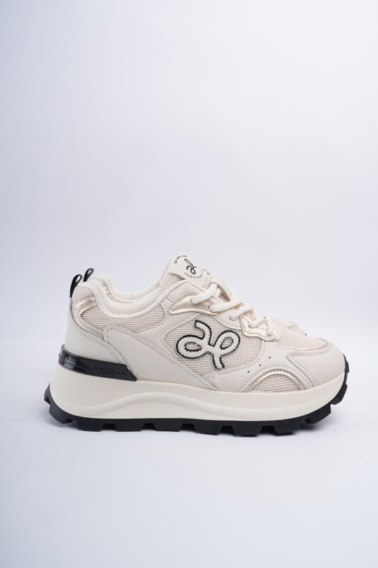 Tenis deportivos beige con plataforma