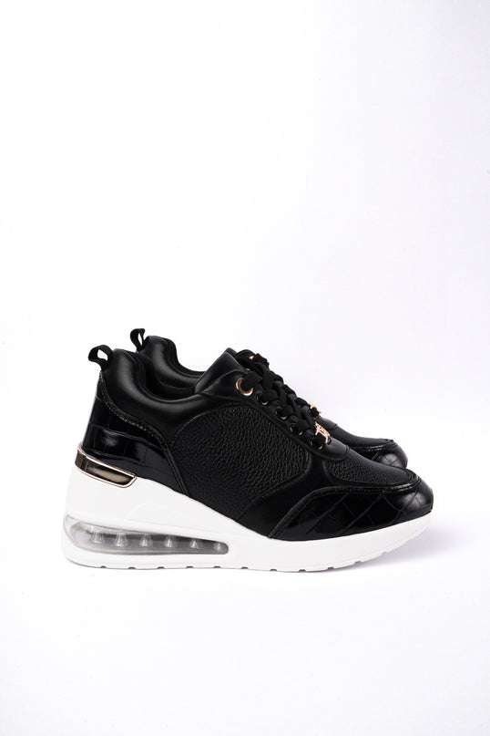 Tenis negros altos con cámara de aire