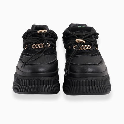 Tenis negros con plataforma y toques dorados