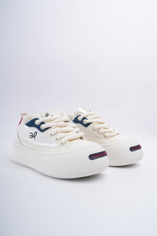 Tenis plataforma crema con azul