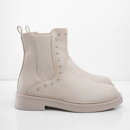 Botines beige clásicos con taches