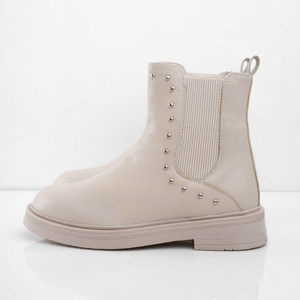 Botines beige clásicos con taches