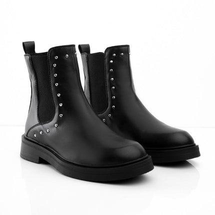Botines negros clásicos con taches