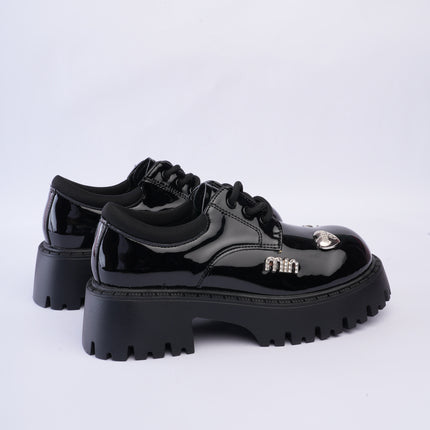 Zapatos charol chunky con apliques plateados